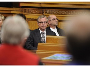 Saskatchewan Premier Brad Wall takes his seat the legislature for his last speech from the throne at the Saskatchewan Legislative Building in Regina, Wednesday, October 25, 2017.