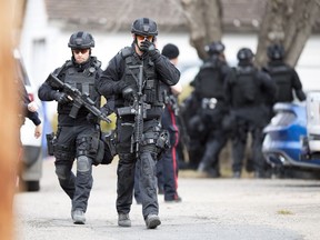 Members of the Regina Police Service and members of their SWAT team surrounded a home on the 1100 block of Elphinstone Street in Regina.