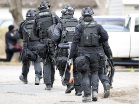 Members of the Regina Police Service and members of their SWAT team surrounded a home on the 1100 block of Elphinstone Street in Regina.