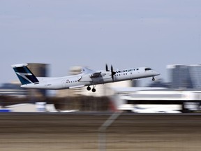 An airplane takes off from the Regina International Airport.