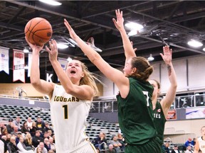 Charlotte Kot, left, is excited to be back with the University of Regina Cougars women's basketball team after knee woes ruined her 2016-17 season.