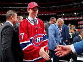 Cale Fleury meets with executives after being selected 87th overall by the Montreal Canadiens during the 2017 NHL Draft at the United Center in Chicago on June 24, 2017.