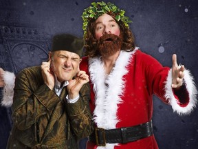 Oliver Becker and Kevin Rothery in the Globe Theatre production of Charles Dickens' A Christmas Carol.