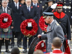 Britain's Prince Charles, Prince of Wales lays a wreath during the Remembrance Sunday ceremony at the Cenotaph on Whitehall in central London, on November 12, 2017.