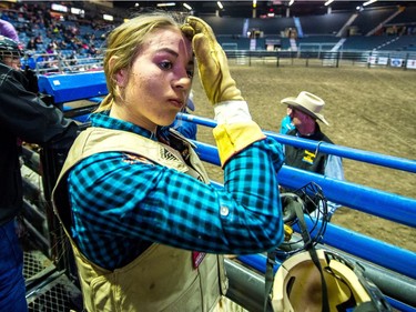 Hanna Bower, 13, of Leader prepares for her next ride at the Steer Riding Rodeo School during Agribition on Saturday, Nov. 25, 2017, at the Brandt Centre. BRANDON HARDER/Regina Leader-Post
BRANDON HARDER