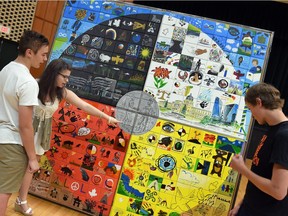 Thomas Jorens (from left), Andra Bacanu and Max Berg were students at Campbell Collegiate in June 2015 when a 256-panel collaborative artwork was unveiled as a part of the Treaty 4: The Next Generation program.