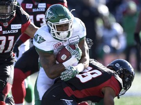 Saskatchewan's Marcus Thigpen (centre) is prepared for heavier work load at tailback against the Edmonton Eskimos on Thursday.