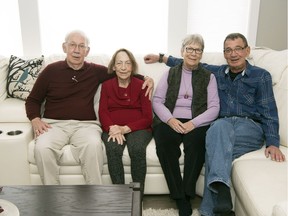 Mark Byington, from left, Jean Fish, Faye Viergutz and Mervin Cross sit together after reuniting this week in Regina.  After decades of searching Jean finally met her brothers Mark and Mervin and sister Faye in person.