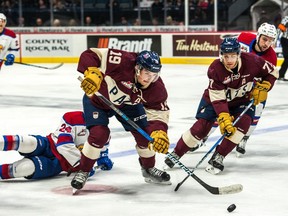 The Regina Pats' Jake Leschyshyn (centre) feels a little better every game after returning from a torn ACL.