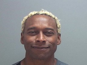 This undated photo provided by the Salt Lake County Jail shows Anthony D. McClanahan. Prosecutors say McClanahan, a former professional football player, sliced his wife's neck and then crawled on the ground outside their rented Utah condominium before flagging down a police officer. Murder charges filed Monday against McClanahan say the bloody Nov. 2 scene in Park City indicated his 28-year-old wife Keri "KC" McClanahan put up a desperate struggle. (Salt Lake County Jail via AP)