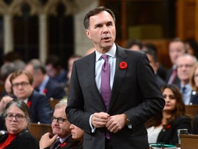 Minister of Finance Bill Morneau stands during question period in the House of Commons on Parliament Hill in Ottawa on Tuesday Nov. 7, 2017.