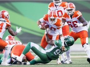 Tobi Antigha, shown sacking B.C. Lions quarterback Jonathon Jennings, was named the Saskatchewan Roughriders' rookie of the year Wednesday.