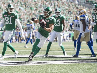 Saskatchewan Roughriders wide receiver Rob Bagg celebrates a touchdown catch in the Labour Day Classic on Sept. 3, 2017.