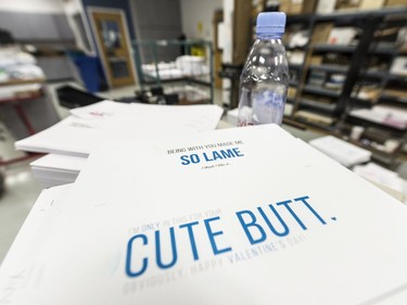 Student work sits on a table in a classroom where Graphic Communication is taught at Saskatchewan Polytechnic.