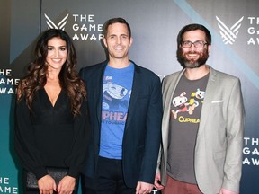 Chad Moldenhauer (centre), Jared Moldenhauer and Chad's wife Maja arrive at the Game Awards 2017 at Microsoft Theater in Los Angeles on Dec. 7, 2017.