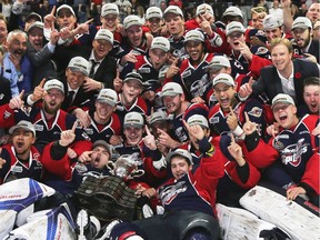 The Windsor Spitfires celebrate the Memorial Cup championship on home ice in 2017.