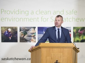 Environment Minister Dustin Duncan releases the province's climate change plan at the Legislative Building in Regina.