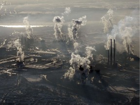 In this Jan. 9, 2009 file photo, smoke rises from the steel company ThyssenKrupp in Duisburg, western Germany. Levels of carbon dioxide in the atmosphere have steadily increased since the days of the industrial revolution, contributing to the greenhouse effect that is spurring global warming.