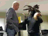 A GIF illustration of clashes between John Gormley and protestors at the U of R in 2014 and Candis McLean and protestors in Saskatoon in April 2017.