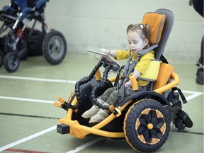 Khyla Buium, a two-year-old with cerebral palsy, along with her mom Julie were at the Wascana Rehabiliation Centre to demonstrate a modified ride-on car that was modified by University of Regina engineering graduate students.