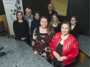 The following people gathered at the Leader-Post on Thursday for Christmas Cheer Fund cheque presentations: (left to right) Heather Persson, Regina Leader-Post editor; Jim Toth of the Leader-Post Foundation; Gwyn Tremblay of SOFIA House; Julie McMillan of WISH Safe House; Rob Vanstone, Regina Leader-Post sports editor; Stephanie Taylor of Regina Transition House; Angeline Anaquod of WISH Safe House; and, Janet Tzupa of the YWCA's Isabel Johnson Shelter. The foundation supports these four women's shelters each year.