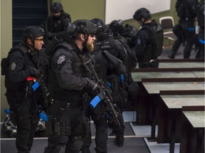 An simulated active-shooter situation plays out as Regina Police Service Emergency Services teams conducted realistic, scenario-based training at Saskatchewan Polytechnic. SWAT members look for other threats.