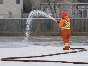 Tina Gessey, leadman City of Regina Parks department,floods the Joanne Goulet outdoor rink in Regina.