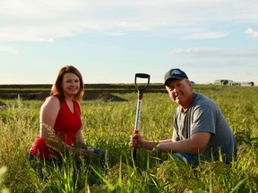 Tannis and Derek Axten on their farm in Minton, Saskatchewan.