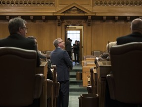 Premier Brad Wall walks into the chamber for question period for the last time at the Legislative Building in Regina.