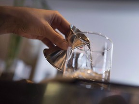 A cocktail is made in Ottawa on April 11, 2015. Like many others who have decided to cut back on drinking, Carolyn Rebeyka has found there are often few interesting drink options that don't include booze.