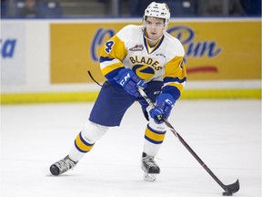 Saskatoon Blades defenceman Dawson Davidson moves the puck against the Medicine Hate Tigers during first-period WHL action in Saskatoon on Wednesday, January 10, 2018.