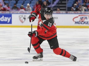 Defenceman Kale Clague, shown playing for Canada at the world junior hockey championship, was acquired by the Moose Jaw Warriors in a WHL blockbuster Wednesday.