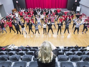 REGINA, SASK : January 22, 2018 - Teacher Janeen Clark, bottom, videos students rehearsing a dance number at Balfour Collegiate in Regina. Some of these students will be part of the new Balfour Arts Collective, which allows students to get their high school diploma while focusing on fine arts. MICHAEL BELL / Regina Leader-Post.