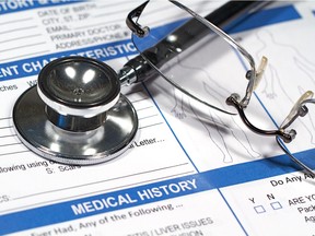 Close up of a Medical History form and a doctor's Stethoscope.