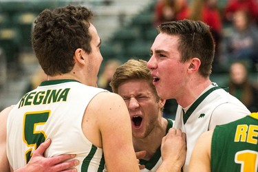 The University of Regina Cougars mens volleyball team celebrate after a particularly strong play during a game against the Thompson Rivers University Wolfpack on Jan. 13, 2017.