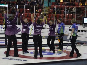 Sherry Anderson's team celebrates its victory at the 2018 provincial Scotties Tournament of Hearts in Melfort.