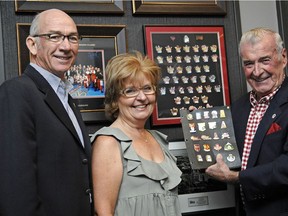 Chris Pasterfield, vice-president of Laurie Artiss Ltd., left, his wife Karen, who is the company's president, and Laurie Artiss are shown in 2011 — the company's 40th year in business.