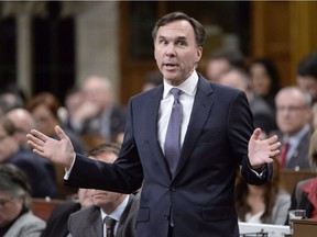 Minister of Finance Bill Morneau responds to a question during Question Period in the House of Commons in Ottawa on Wednesday, Nov. 29, 2017.