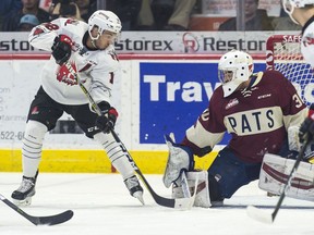The Moose Jaw Warriors' Jayden Halbgewachs, left, leads the WHL in goals (68) with two regular-season games remaining.