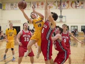 The LeBoldus Golden Suns' Ben Campliin, 10, attempts to score while guarded by the Miller Marauders' Michael Clow, 6, in pre-LIT action Tuesday.
