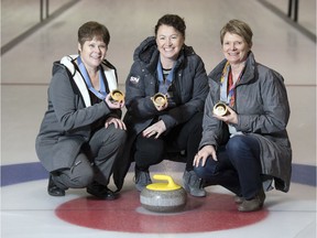 Jan Betker (left), Joan McCusker and Marcia Gudereit won the first gold medal awarded in curling at the 1998 Winter Olympics.