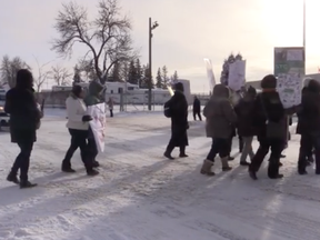 Protesters were on hand at Prairieland Park in Saskatoon slowing vehicles trying to enter for the Saskatchewan Party convention where a new leader will be voted in later today.