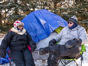 Jenny Gardipy, left, and Lamarr Oksasikewiyin  laugh together during a winter camping workshop held at the Living Skies Retreat Centre in the Lumsden Valley. They were cracking jokes and in good spirits despite the frigid temperatures they would have to endure during their overnight stay.