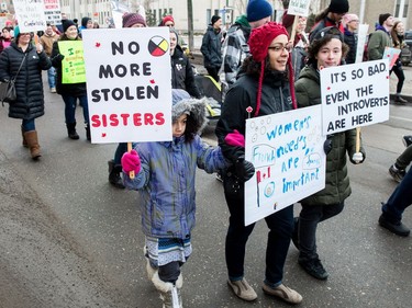 Participants in the Women's March Regina walk along Victoria Avenue on Jan. 20, 2018.