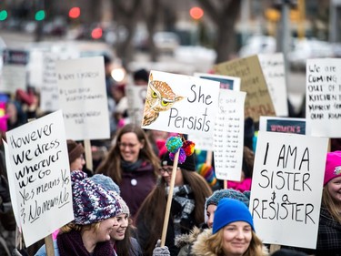 Participants in the Women's March Regina walk along Victoria Avenue on Jan. 20, 2018.