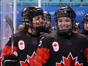Emily Clark #26 and Melodie Daoust #15 of Canada react after defeating Team Finland 4-1 in the Women's Ice Hockey Preliminary Round - Group A game on day four of the PyeongChang 2018 Winter Olympic Games at Kwandong Hockey Centre on February 13, 2018 in Gangneung, South Korea.