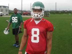 Quarterback B.J. Daniels, shown at the Saskatchewan Roughriders' 2013 mini-camp in Bradenton, Fla., is still on the CFL team's negotiation list.