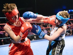 Denys Hutsol, left, of the Lonsdale Boxing Club faces Medicine Hat's Wolfgang Edwards at Battle of the Prairies in 2014.