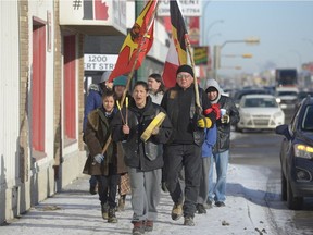 REGINA, SASK:  Feb. 23, 2018 --  A group of people march down Albert Street protesting the verdict in the Raymond Cormier case. Cormier was accused of killing 15-year-old Tina Fontaine, but was acquitted. The group said they were marching in solidarity with others who were holding an event in Winnipeg. BRANDON HARDER/Regina Leader-Post
