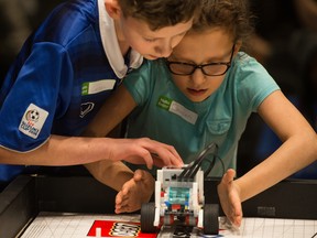 Each team's Lego robot was custom built and programmed by competitors.